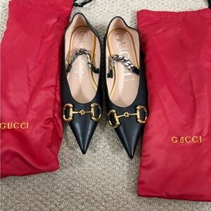 Gucci Black Leather Flats with Gold Accents